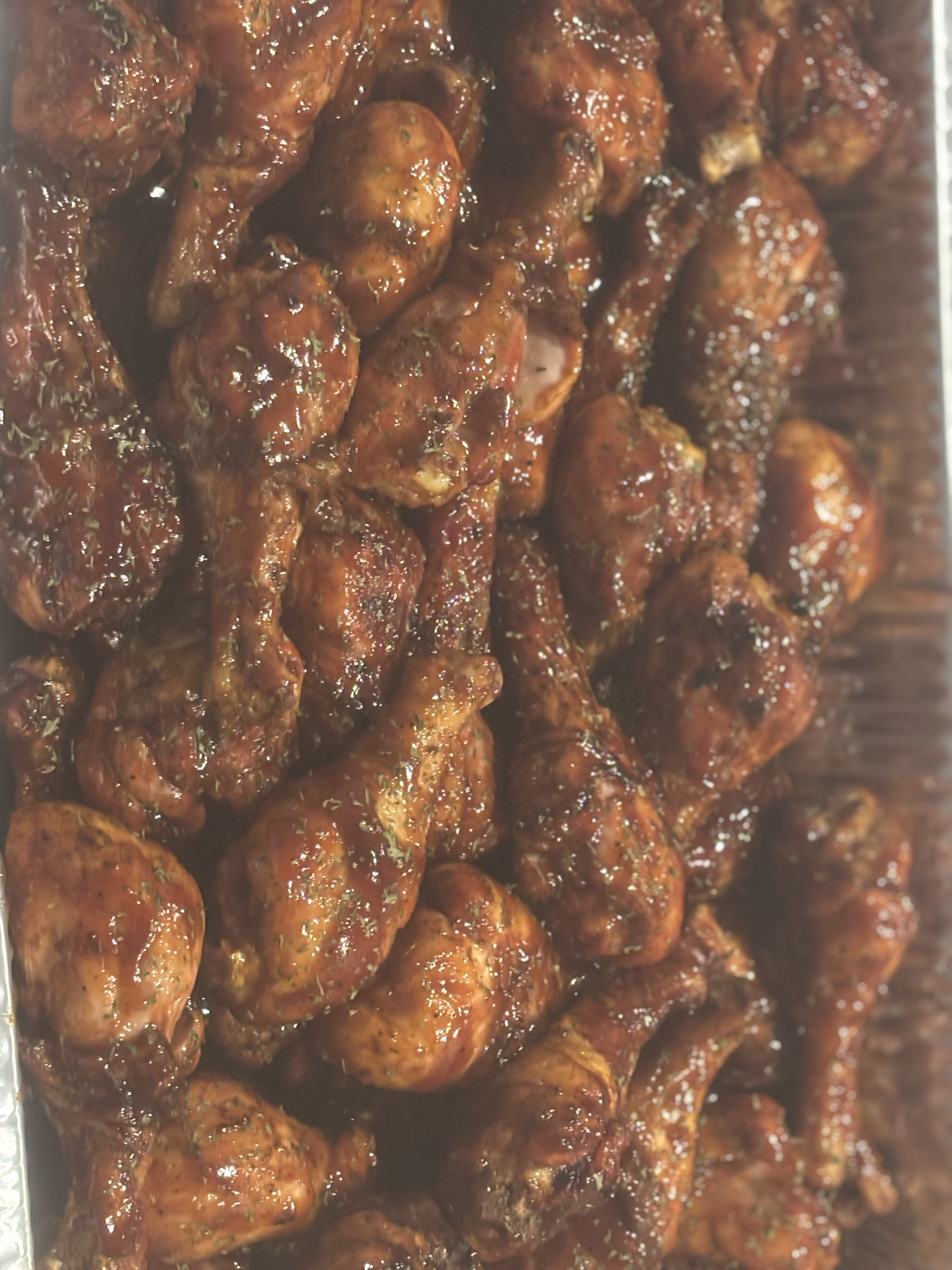 Sticky BBQ wings glazed in sauce